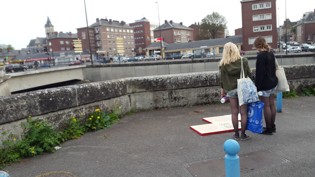 People in front of a slab